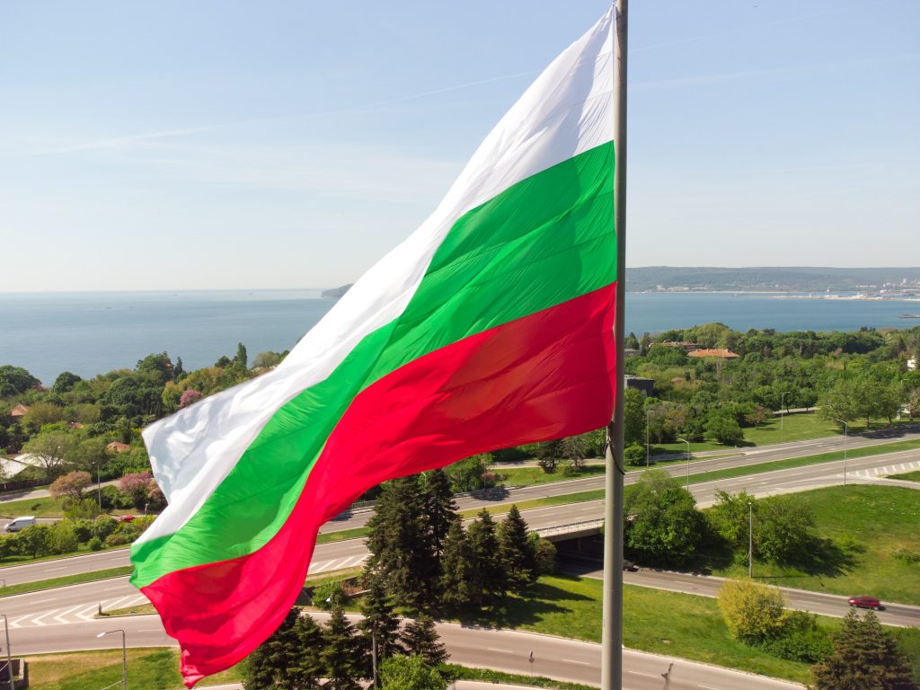 Bulgaria Flag Against City Varna at summer day