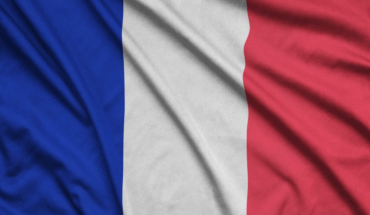 France flag is depicted on a sports cloth fabric with many folds. Sport team waving banner
