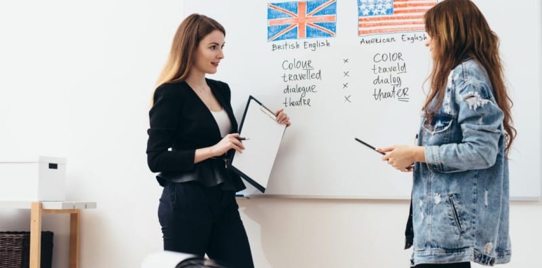 English language school. Lesson, teacher and student talking